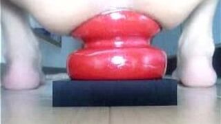 The image medley of a huge red plug - porn video